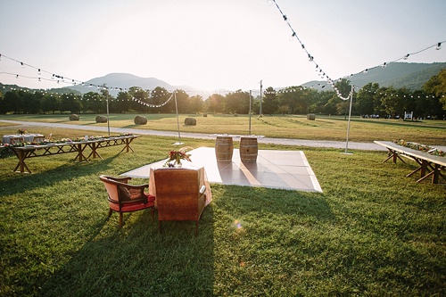 Beautiful boho-chic outdoor wedding at Blue Toad Cidery in Nelson County, Virginia with specialty rentals by Paisley & Jade 