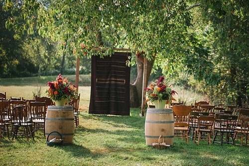 Beautiful boho-chic outdoor wedding at Blue Toad Cidery in Nelson County, Virginia with specialty rentals by Paisley & Jade 