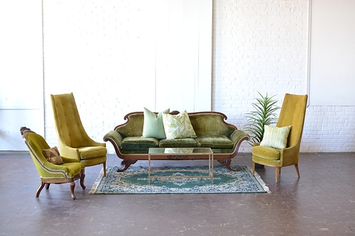 Vintage and eclectic lounge areas styled with monochromatically colored upholstered furniture available for rent for weddings and events by Paisley & Jade 